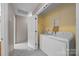 Clean laundry room with white appliances and tile floor at 1401 Thompson Ave, Charlotte, NC 28216