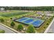 Aerial view of community sports facilities, including tennis courts and sports fields at 145 Marron Dr, Indian Trail, NC 28079
