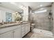 Elegant bathroom features a double vanity, glass shower, and modern finishes at 145 Marron Dr, Indian Trail, NC 28079