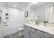 Bathroom featuring a shower-tub combo, vanity with quartz countertop, and modern fixtures at 145 Marron Dr, Indian Trail, NC 28079