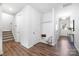 Welcoming entryway with wood floors, bench seating, and plenty of natural light at 145 Marron Dr, Indian Trail, NC 28079