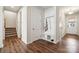 Inviting foyer with hardwood floors, a convenient mudroom bench, and ample closet space at 145 Marron Dr, Indian Trail, NC 28079