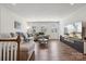 Spacious living room with natural light, hardwood floors, and a comfortable sectional sofa at 145 Marron Dr, Indian Trail, NC 28079