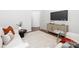 Relaxing living room featuring stylish furniture, a TV, and access to other areas of the home at 145 Marron Dr, Indian Trail, NC 28079