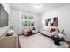 Comfortable living room with neutral tones, modern furnishings, and ample natural light at 145 Marron Dr, Indian Trail, NC 28079