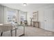 Home office featuring a modern desk setup with a large window and neutral decor at 145 Marron Dr, Indian Trail, NC 28079
