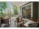 Covered patio with comfortable seating, ideal for relaxing and enjoying the outdoors at 145 Marron Dr, Indian Trail, NC 28079