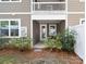 Townhome rear exterior showing door access to the back patio at 145 Marron Dr, Indian Trail, NC 28079
