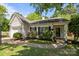 Charming single-story home boasts curb appeal with lush landscaping and a welcoming entrance at 16117 Wrights Ferry Rd, Charlotte, NC 28278