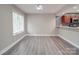 Inviting dining area with abundant natural light and modern gray flooring at 1847 J Julian Ln # A, Charlotte, NC 28208