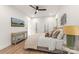 Spacious bedroom with natural light, neutral decor, and an exposed decorative ladder at 1847 Vinton St, Charlotte, NC 28216