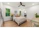 Comfortable bedroom with hardwood floors, neutral decor, and plenty of natural light at 1847 Vinton St, Charlotte, NC 28216