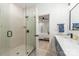 Modern bathroom showcasing a glass walk-in shower with stylish tilework at 1847 Vinton St, Charlotte, NC 28216