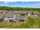 Overhead angle of home highlighting its position in the community, complete with screened porch and playground at 194 Canada Dr, Statesville, NC 28677