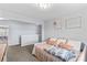 Cozy bedroom featuring a daybed with decorative pillows and soft lighting, perfect for relaxation at 194 Canada Dr, Statesville, NC 28677
