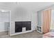 Neutral-toned bedroom featuring minimalist decor, a chalkboard wall, and a window for natural light at 194 Canada Dr, Statesville, NC 28677
