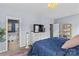 Comfortable bedroom with light blue walls and view to en suite bathroom at 194 Canada Dr, Statesville, NC 28677