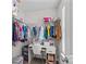 Organized walk-in closet with ample storage, a built-in desk, and natural light, ideal for staying tidy at 194 Canada Dr, Statesville, NC 28677