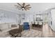 Open concept living room featuring modern furnishings and view to the kitchen at 194 Canada Dr, Statesville, NC 28677