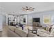 Open concept living room featuring modern furnishings and view to the kitchen at 194 Canada Dr, Statesville, NC 28677