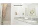 Bathroom featuring a double vanity with granite countertop and shower-tub combination at 201 Giant Oak Ave, Statesville, NC 28677