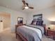 Charming bedroom featuring a ceiling fan, wooden furniture, and a bright and inviting atmosphere at 2037 Christopher Wood Ct, Indian Land, SC 29707