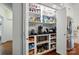 Walk-in pantry with ample shelving and countertop space, perfect for storage and organization at 21300 Crown Lake Dr, Cornelius, NC 28031