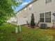 A well maintained backyard patio features an outdoor dining set, air conditioner and privacy fence at 2137 Midnight Blue Ln, Fort Mill, SC 29708