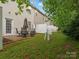 Cozy backyard patio featuring an outdoor dining set, perfect for enjoying meals and relaxation at 2137 Midnight Blue Ln, Fort Mill, SC 29708