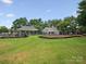 Lush community green space featuring the community pool, playground and gazebos at 2137 Midnight Blue Ln, Fort Mill, SC 29708
