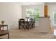 Elegant dining area featuring a modern chandelier and large window at 2137 Midnight Blue Ln, Fort Mill, SC 29708