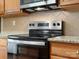 Close up of a kitchen showcasing a stainless steel oven with granite countertops at 2137 Midnight Blue Ln, Fort Mill, SC 29708