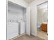 Laundry room with washer, dryer and open door to the bathroom at 2137 Midnight Blue Ln, Fort Mill, SC 29708