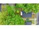 Aerial view of property showcasing the home's layout, landscaping, and green boundaries at 218 5Th Se St, Hickory, NC 28602