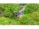 Bird's eye view shows home and surrounding neighborhood, with verdant trees at 218 5Th Se St, Hickory, NC 28602