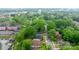 Overhead view displays the home in a treed neighborhood setting with city views at 218 5Th Se St, Hickory, NC 28602