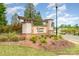 Attractive brick and wood community sign, announcing Canopy Creek with manicured landscaping at 2202 Cherrybark Ct, Denver, NC 28037