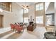 Open living room with soaring ceilings and ample seating at 2235 Legacy Oak Dr, Waxhaw, NC 28173
