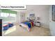 Comfortable bedroom featuring a window, carpet flooring, and colorful decor at 3018 Sassafras Trl, Gastonia, NC 28056