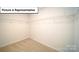 Walk-in closet showcasing adjustable wire shelving and neutral carpeting, perfect for organized storage at 3018 Sassafras Trl, Gastonia, NC 28056