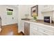 Stylish bar area with granite countertops, stainless steel appliances, and custom cabinetry, perfect for entertaining guests at 310 Whitestone Rd, Charlotte, NC 28270