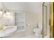 Charming bathroom boasts gold hardware, glass shower, and built-in shelving at 310 Whitestone Rd, Charlotte, NC 28270