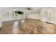 Large bonus room features built-in shelving and laminate flooring at 310 Whitestone Rd, Charlotte, NC 28270