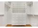 Spacious closet featuring custom built in white shelving with lots of drawer and storage space at 310 Whitestone Rd, Charlotte, NC 28270