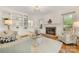 Comfortable living room with built-in shelves, fireplace and natural light, perfect for relaxation and entertaining at 310 Whitestone Rd, Charlotte, NC 28270