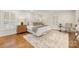 Bright main bedroom features hardwood floors and neutral paint at 310 Whitestone Rd, Charlotte, NC 28270