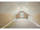Spacious bonus room with neutral carpeting, dormer window, and a ceiling fan at 3327 Flagler Cir, Midland, NC 28107
