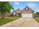 Brick home featuring a well-manicured lawn, a two-car garage, and a classic design at 3327 Flagler Cir, Midland, NC 28107