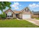 Attractive brick home with an attached two-car garage, lush lawn, and tidy landscaping at 3327 Flagler Cir, Midland, NC 28107