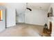 Inviting living room with vaulted ceilings, ceiling fan, and fireplace offers a bright and airy space at 3327 Flagler Cir, Midland, NC 28107